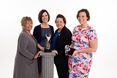 three female finalists with the ATHENA award and the young professional finalist with the award